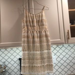 Adorable white and gold dress.